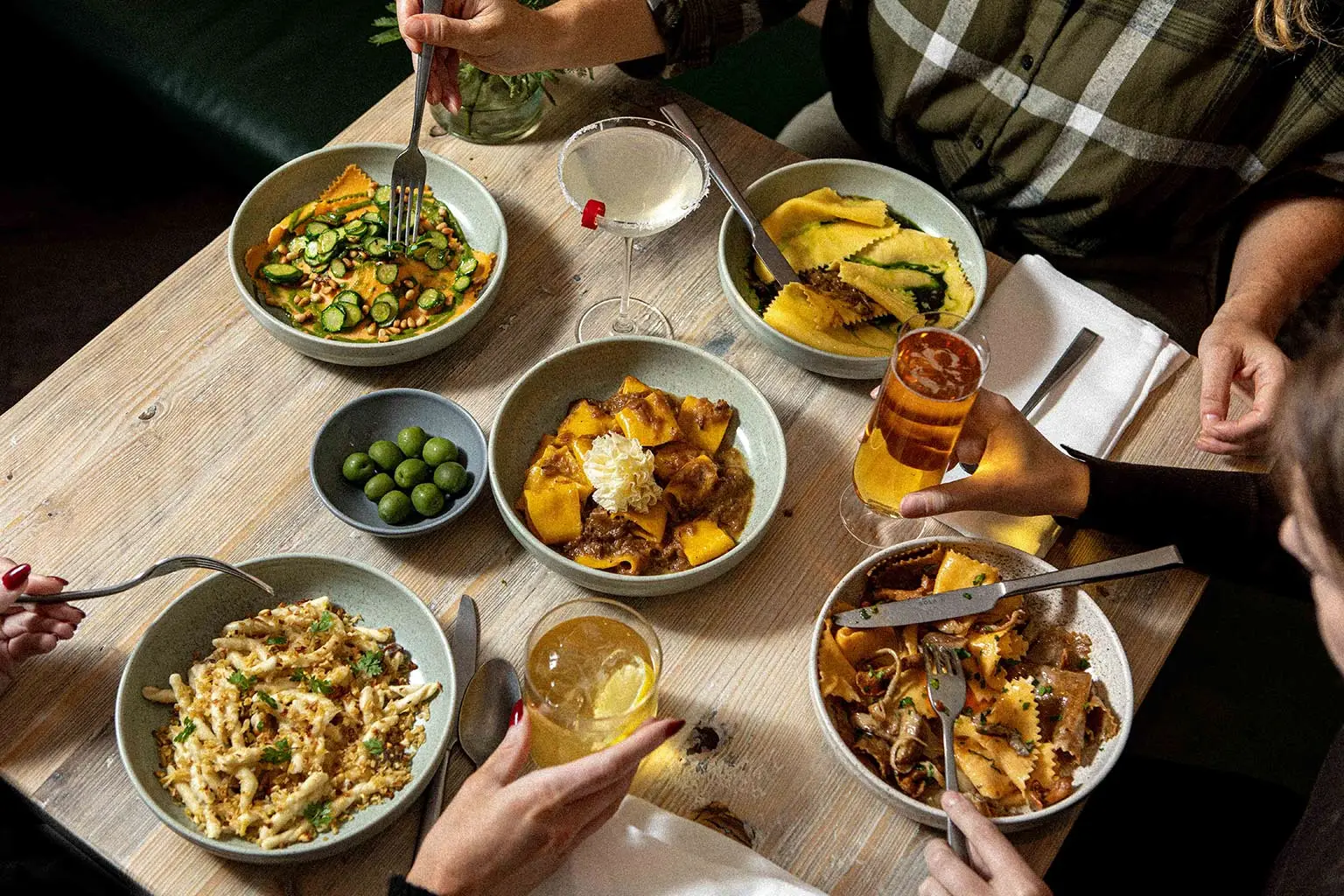 People enjoying their meal at noci with fresh pasta and cocktails on tap